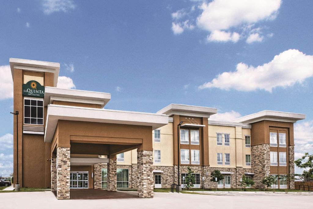 a rendering of the front of a hotel at La Quinta by Wyndham San Antonio by Frost Bank Center in San Antonio