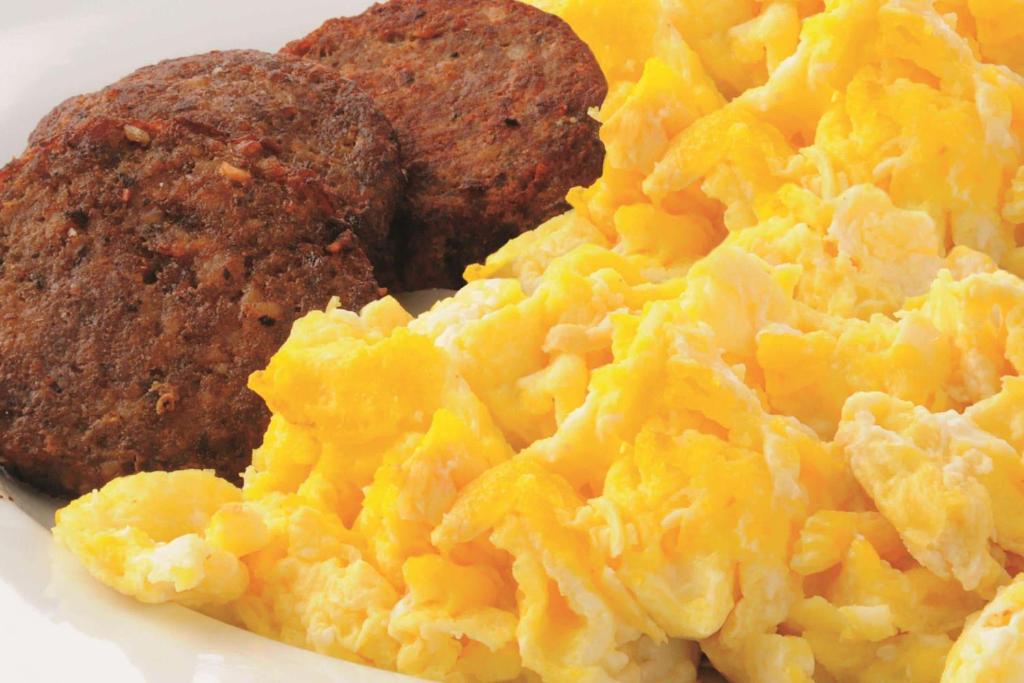 a plate of food with eggs and meatballs at La Quinta Inn & Suites - New River Gorge National Park in Summersville