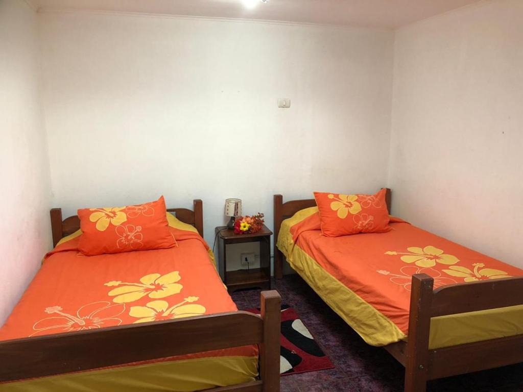 Postel nebo postele na pokoji v ubytování Hostal Vaihere