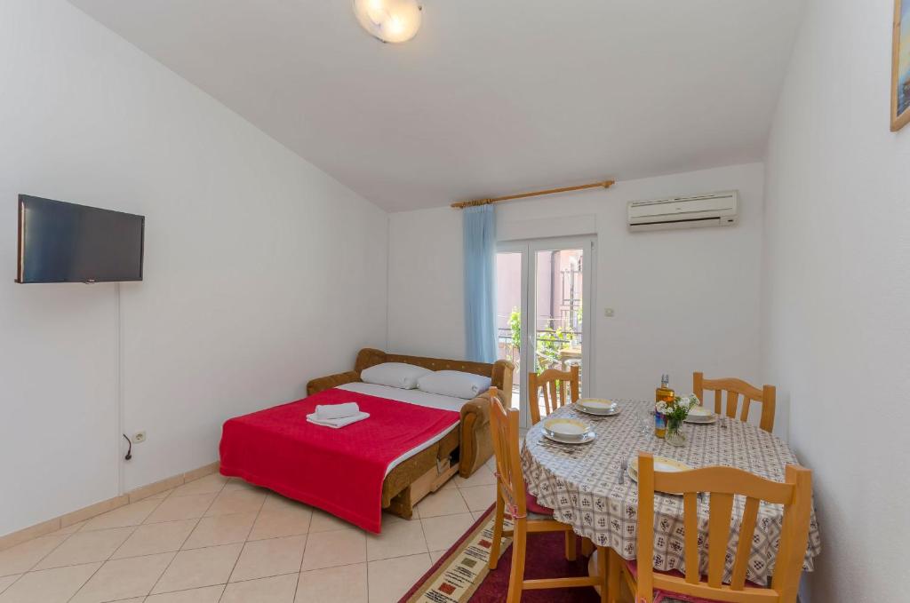 Posteľ alebo postele v izbe v ubytovaní Apartments Sklopina