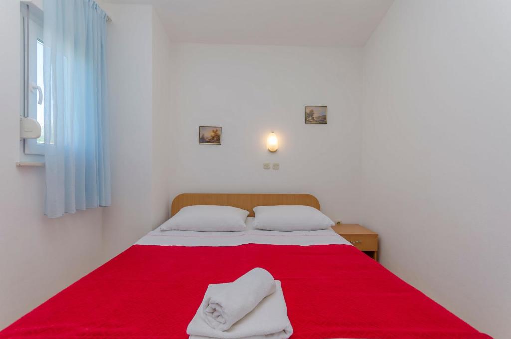 Posteľ alebo postele v izbe v ubytovaní Apartments Sklopina