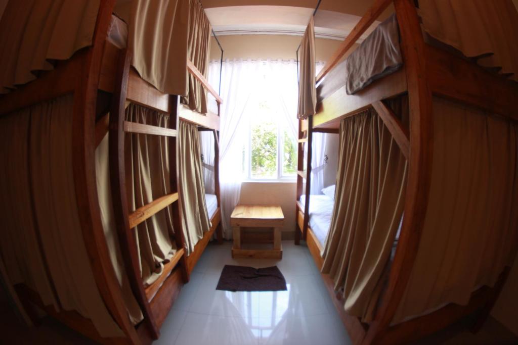 Postel nebo postele na pokoji v ubytování Kokos Hostel Padang City