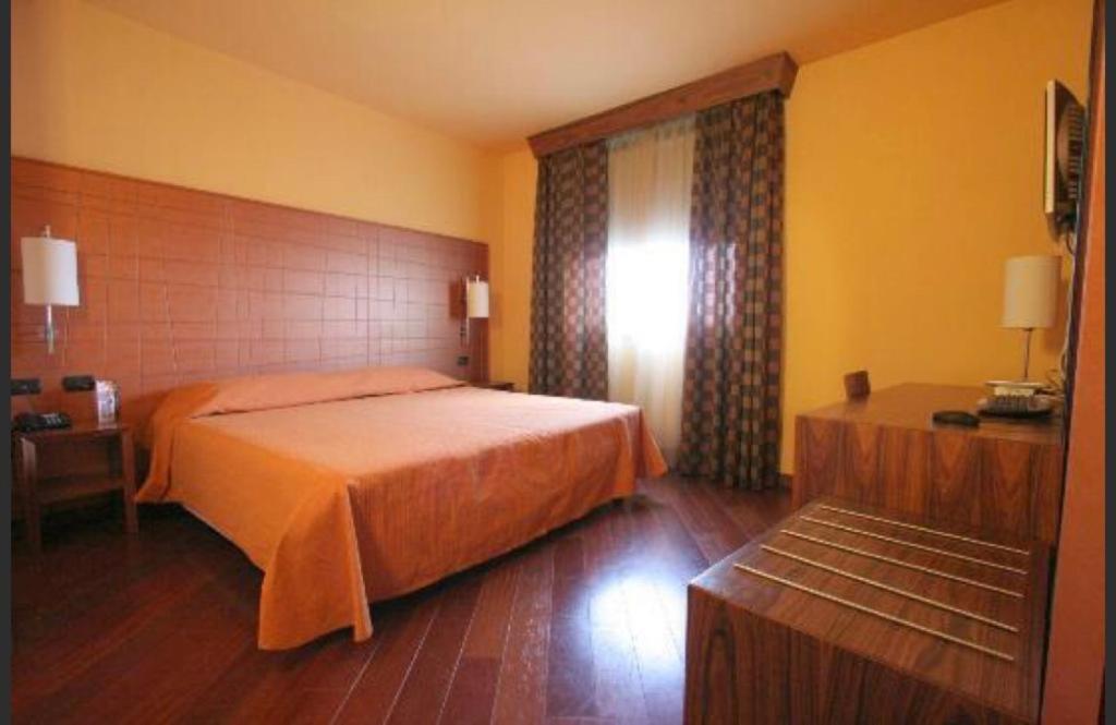 Postel nebo postele na pokoji v ubytování Laghi Room Only