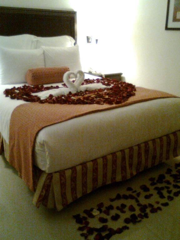 Postel nebo postele na pokoji v ubytování Hotel Lopez Campeche