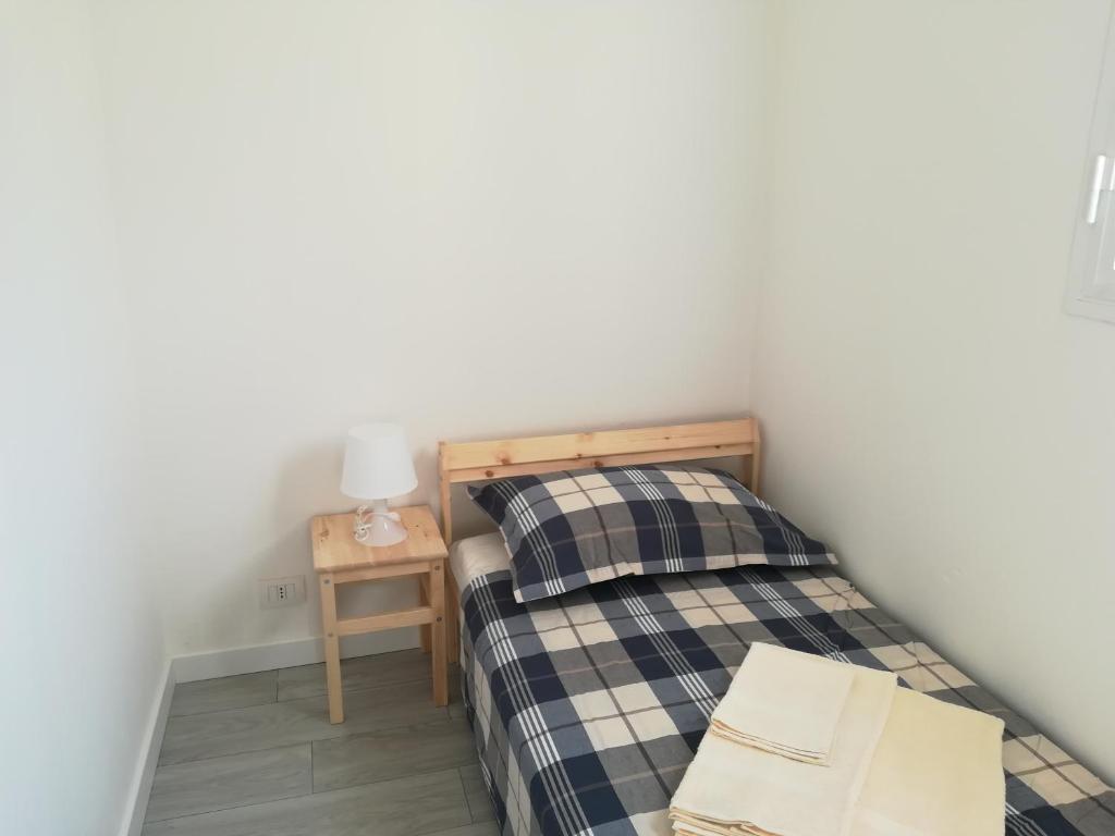 Posteľ alebo postele v izbe v ubytovaní Case degli Avi, camere nel Borgo marinaro