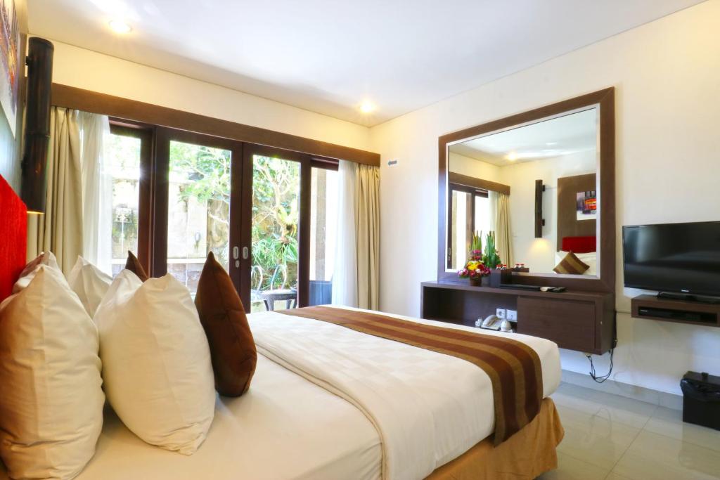 TV a/nebo společenská místnost v ubytování The Swaha Ubud Hotel