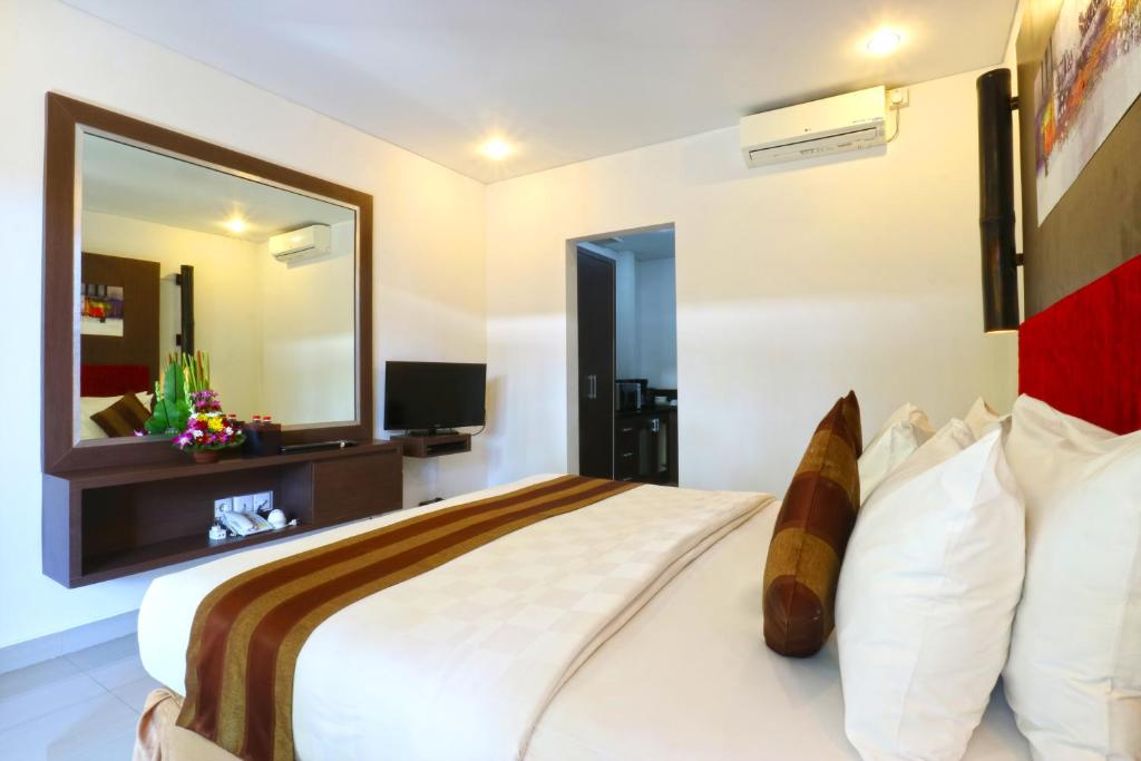 TV a/nebo společenská místnost v ubytování The Swaha Ubud Hotel
