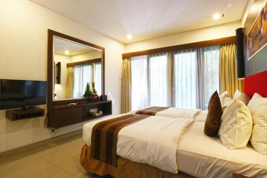 TV a/nebo společenská místnost v ubytování The Swaha Ubud Hotel
