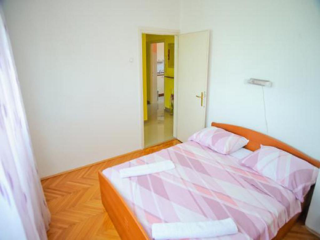 Posteľ alebo postele v izbe v ubytovaní Apartment Ivona Centar Zadar