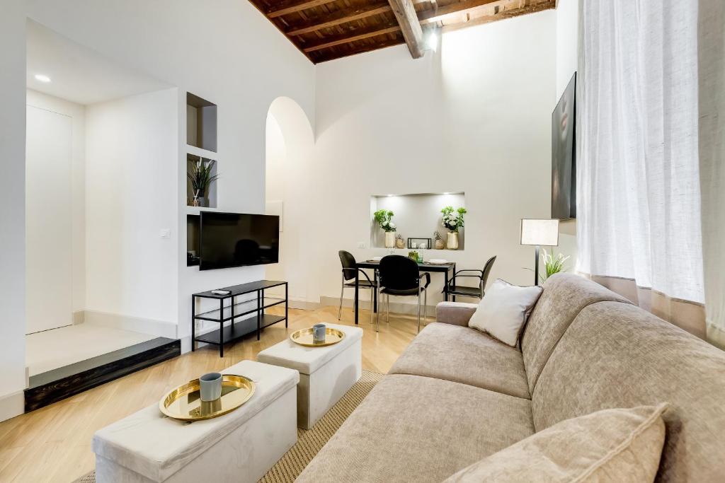 Televízia a/alebo spoločenská miestnosť v ubytovaní Trevi Chic House