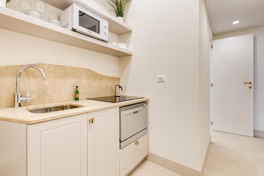 Kuchyňa alebo kuchynka v ubytovaní Trevi Chic House