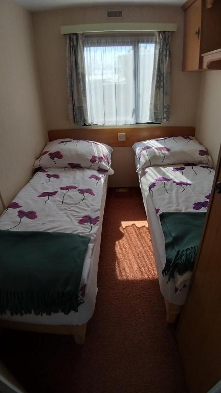 Postel nebo postele na pokoji v ubytování Cichy Zakątek