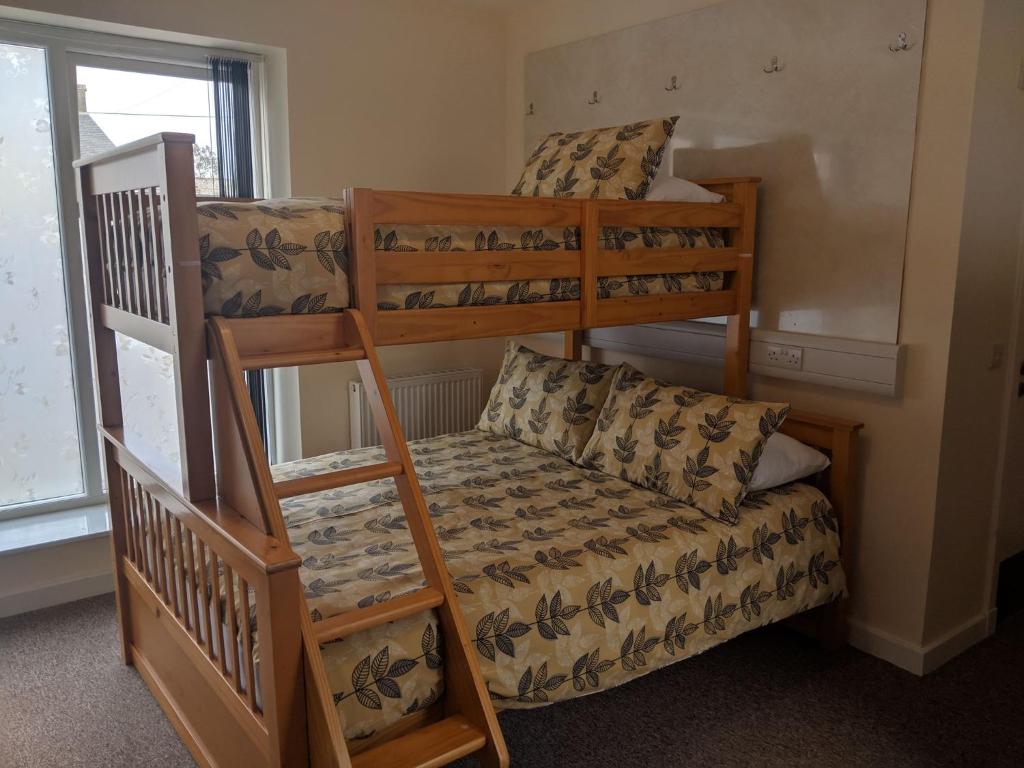 Postel nebo postele na pokoji v ubytování Barholm Accommodation