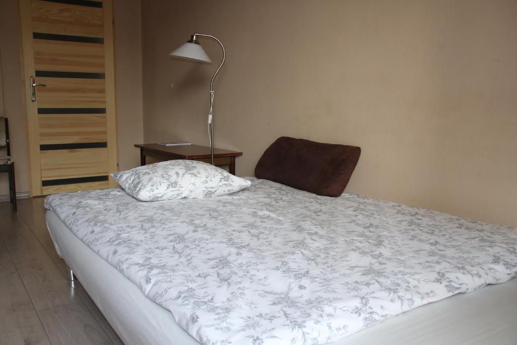 Posteľ alebo postele v izbe v ubytovaní Apartment Widok