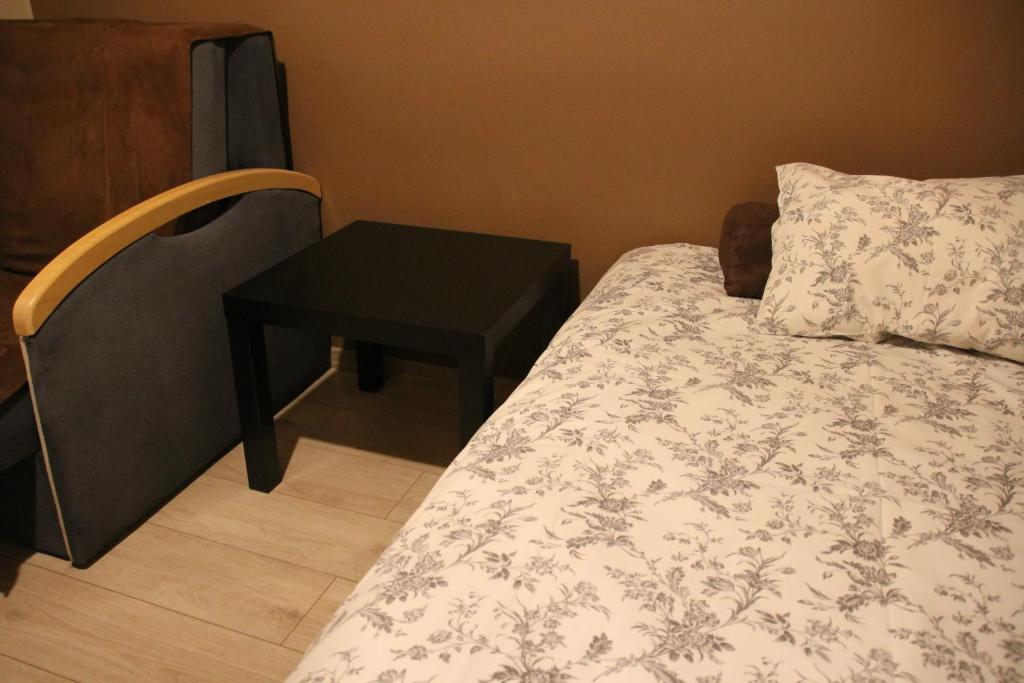 Posteľ alebo postele v izbe v ubytovaní Apartment Widok