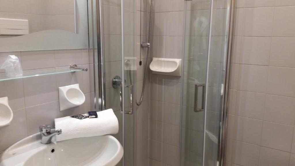 Koupelna v ubytování Albergo Al Cacciatore