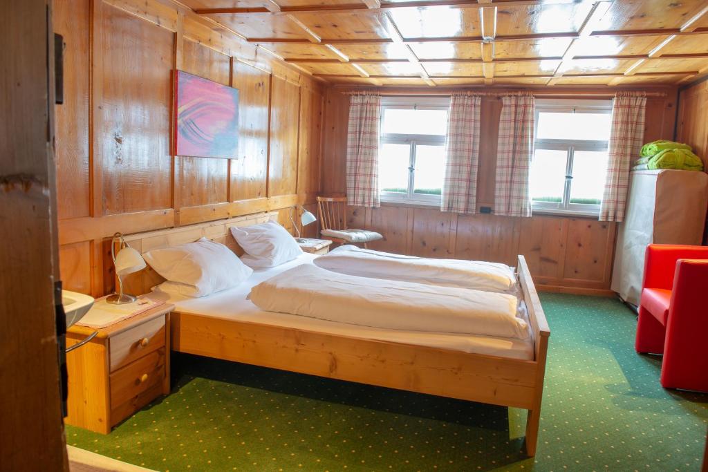 Postel nebo postele na pokoji v ubytování Bio-Hotel Saladina