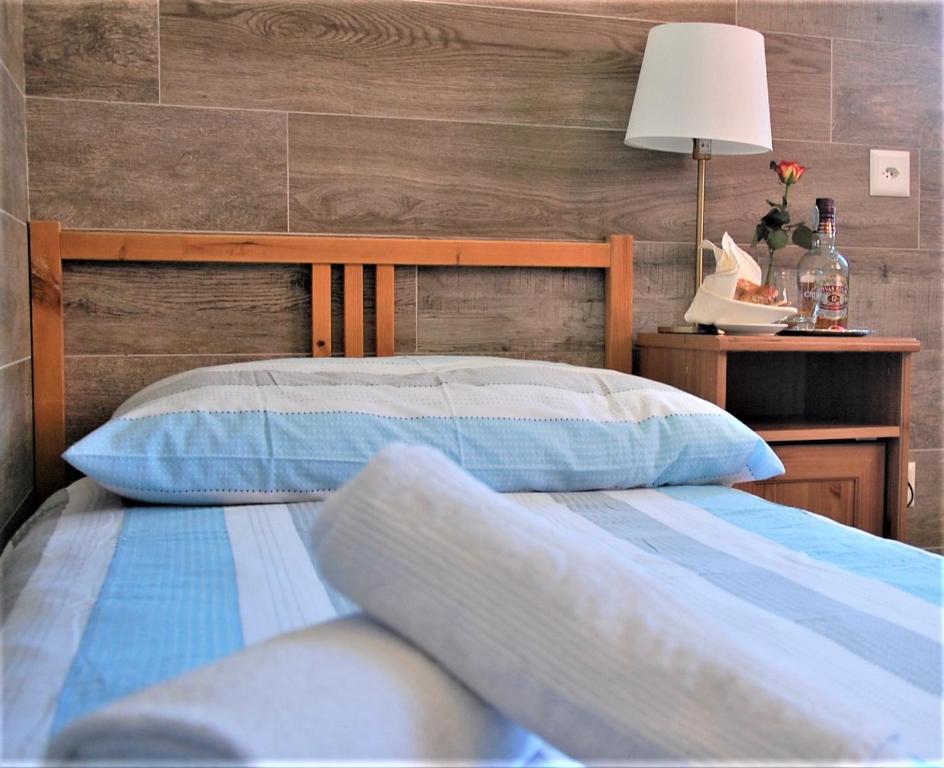 Postel nebo postele na pokoji v ubytování Hotel della Posta