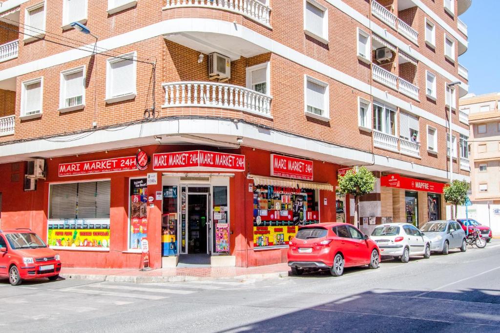 Supermarket nebo jiné obchody v  apartmánu nebo okolí