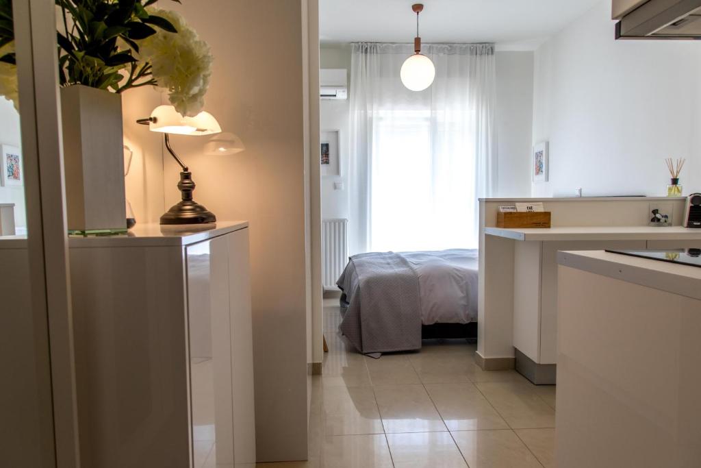 Posteľ alebo postele v izbe v ubytovaní The Modern Suite