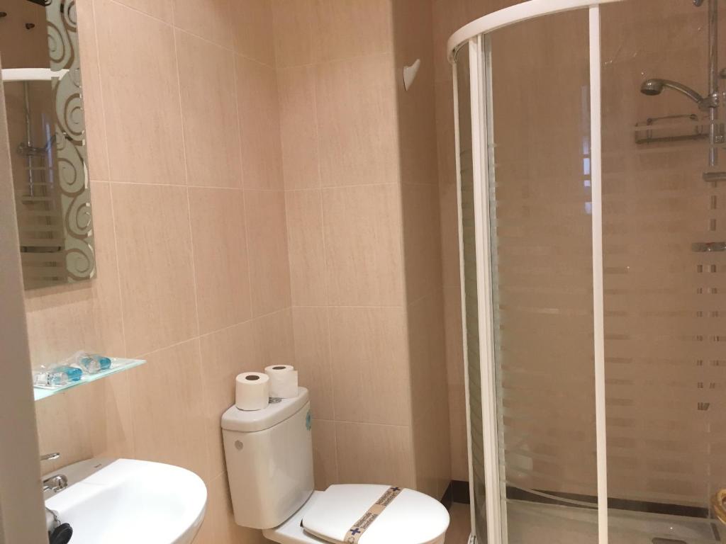 Koupelna v ubytování INSIDEHOME Valladolid Centro -Hab con baño privado en el centro y OPCION DE PARKING-