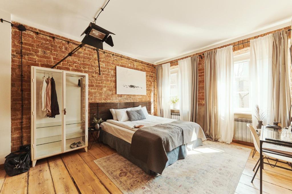 Posteľ alebo postele v izbe v ubytovaní ARTHOTEL STALOWA 52