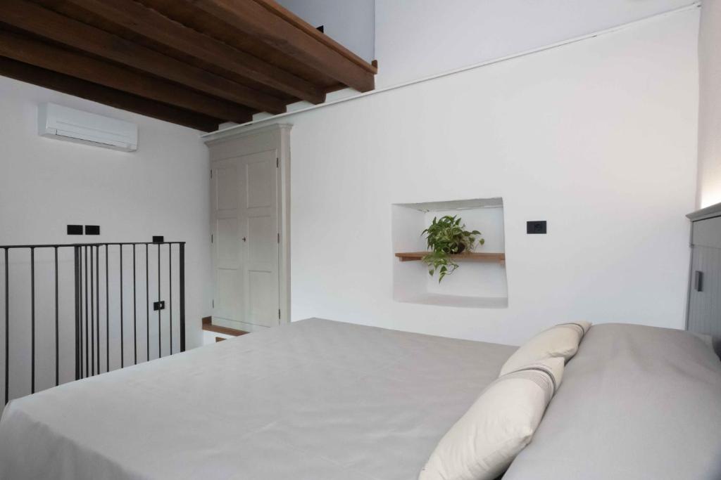 Postel nebo postele na pokoji v ubytování Agriturismo Ca Du Briccu