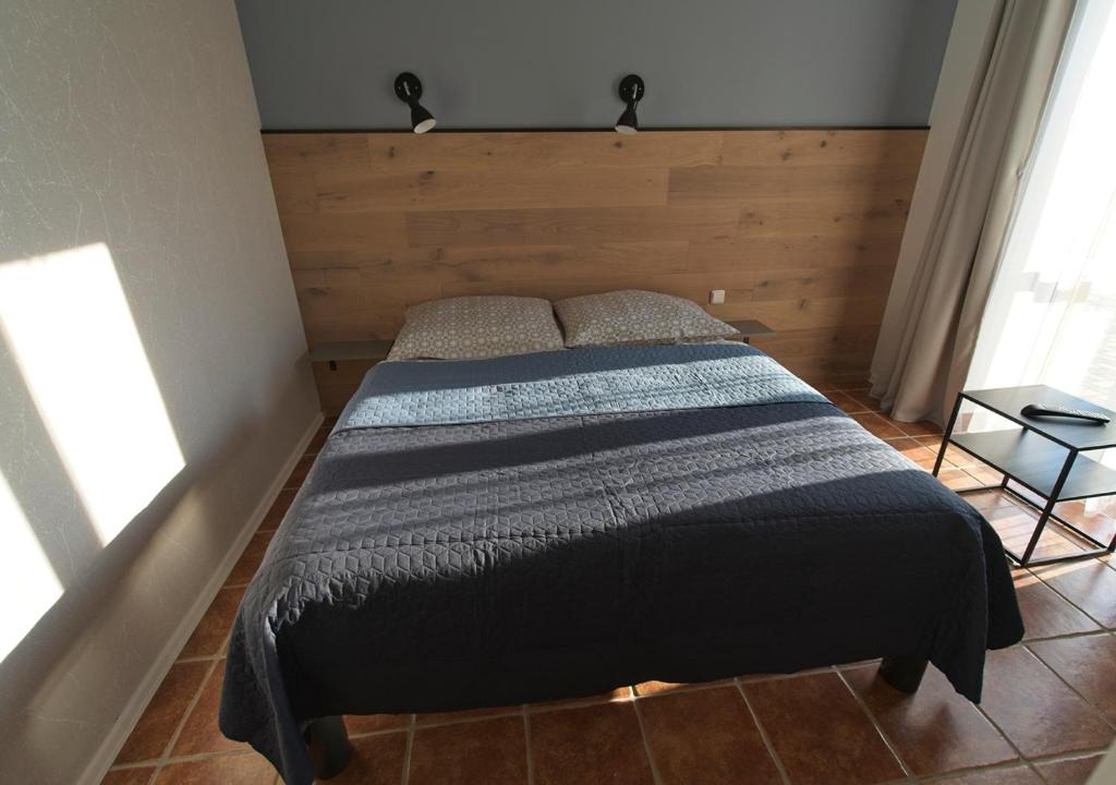 Postel nebo postele na pokoji v ubytování Penzion Rožmberk