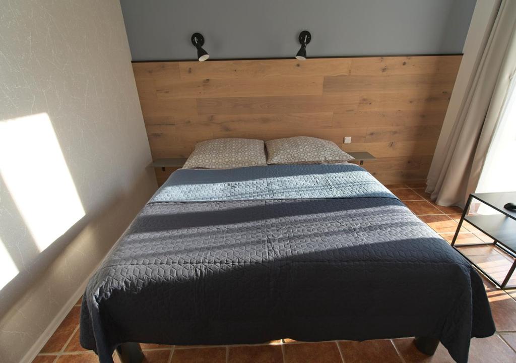 Postel nebo postele na pokoji v ubytování Penzion Rožmberk