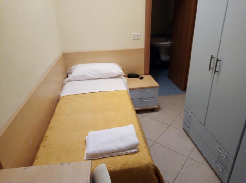 Postel nebo postele na pokoji v ubytování Hotel Fantasy