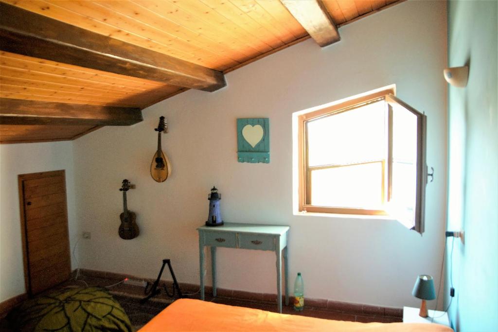 Postel nebo postele na pokoji v ubytování Casa Gnigni