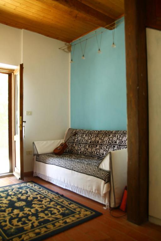 Postel nebo postele na pokoji v ubytování Casa Gnigni