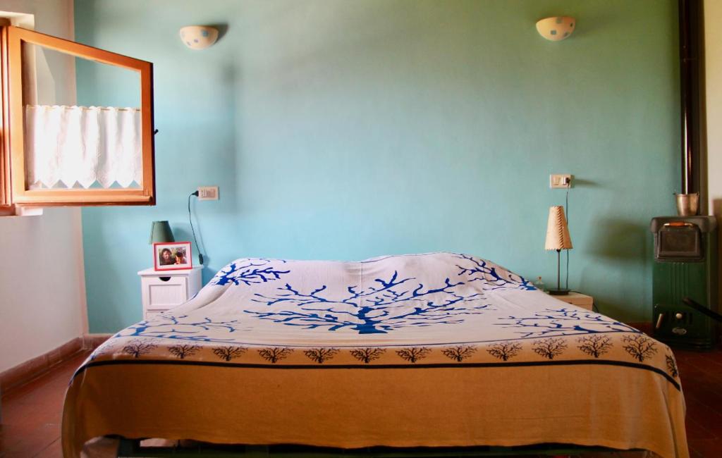 Postel nebo postele na pokoji v ubytování Casa Gnigni