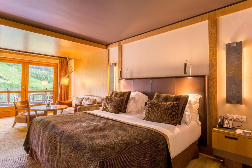 Postel nebo postele na pokoji v ubytování Sport Hotel Hermitage & Spa