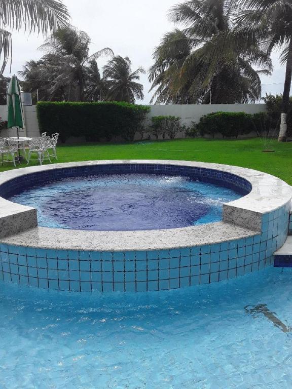  Sonia Flats - Apartamento térreo em condominio em frente à Praia de Camurupim