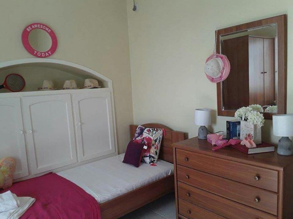 Posteľ alebo postele v izbe v ubytovaní Kalymnos Beach House
