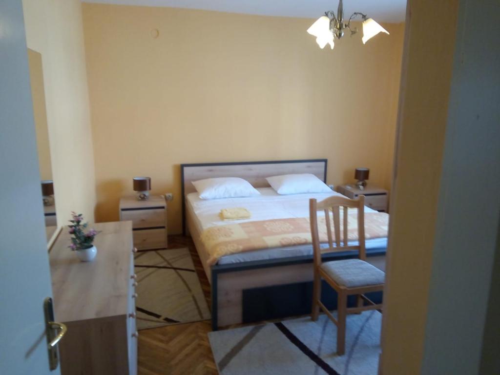 Postel nebo postele na pokoji v ubytování Apartment Singa