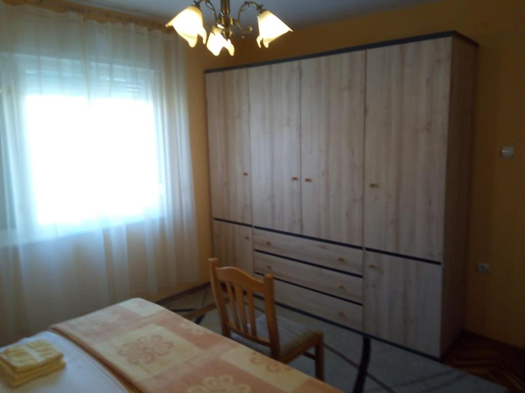 Postel nebo postele na pokoji v ubytování Apartment Singa