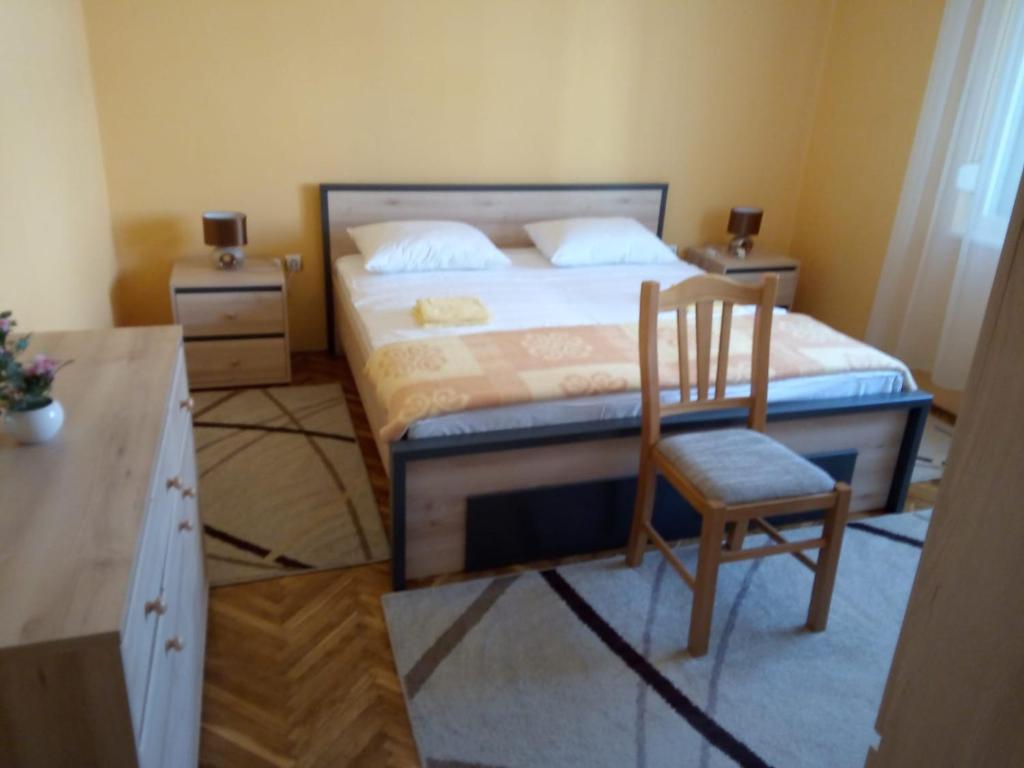 Postel nebo postele na pokoji v ubytování Apartment Singa