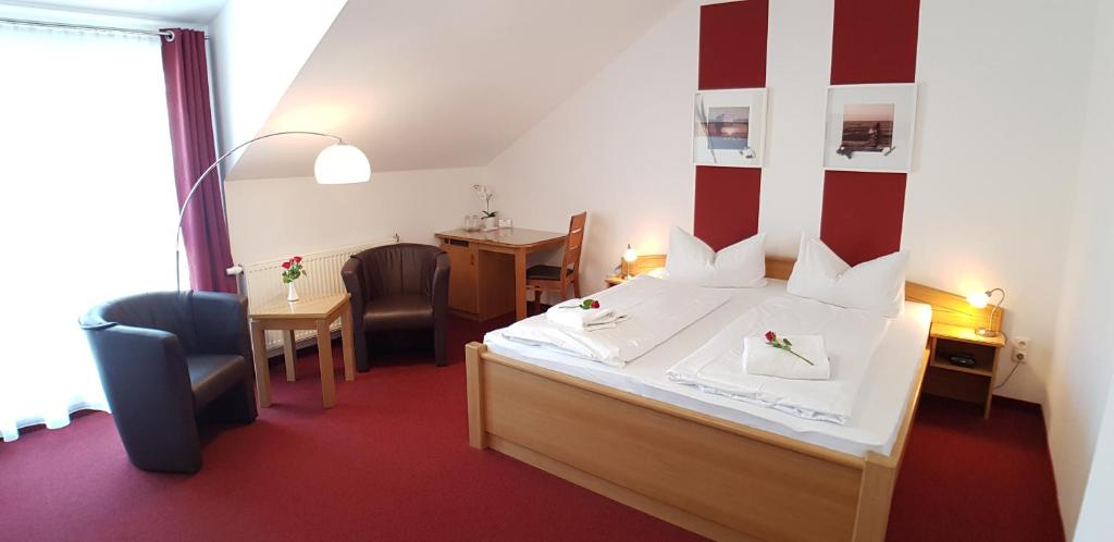 Postel nebo postele na pokoji v ubytování Pension Haus Waldesblick