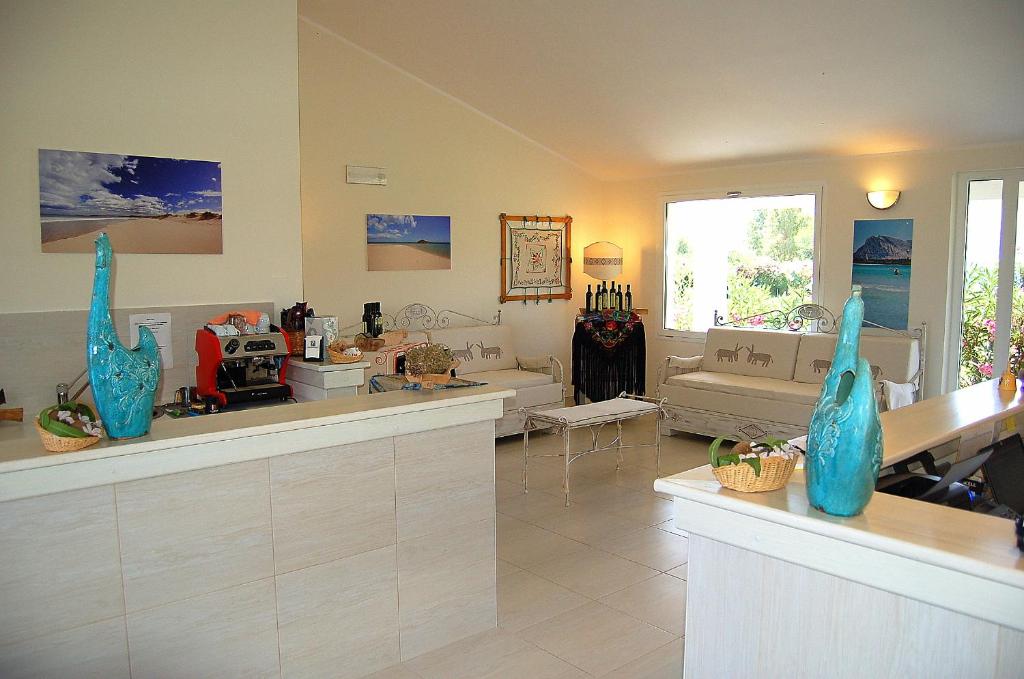Kuchyň nebo kuchyňský kout v ubytování Hotel Budoni Beach