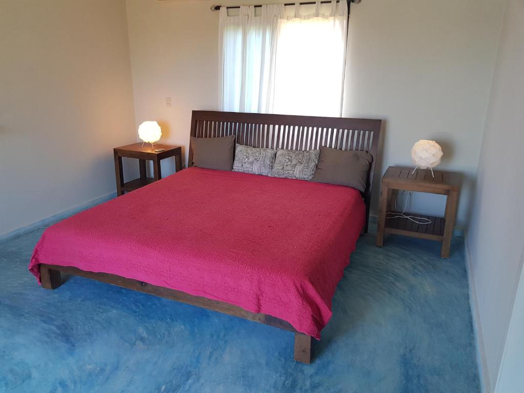 Postel nebo postele na pokoji v ubytování House 24 in Casa Linda