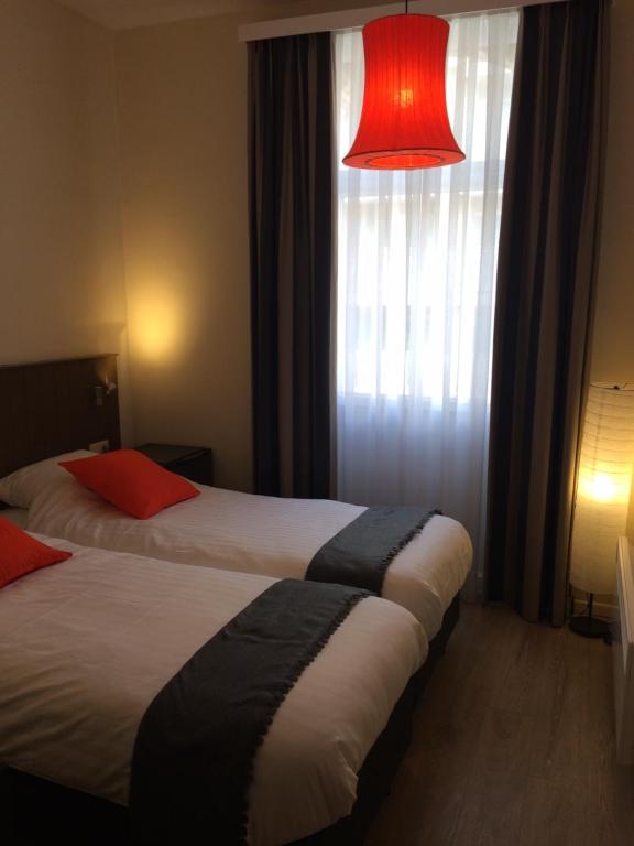 Postel nebo postele na pokoji v ubytování B&B Geste d' Alice