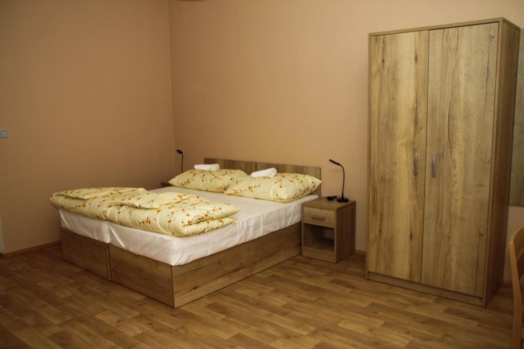 Postel nebo postele na pokoji v ubytování Penzion Daníž