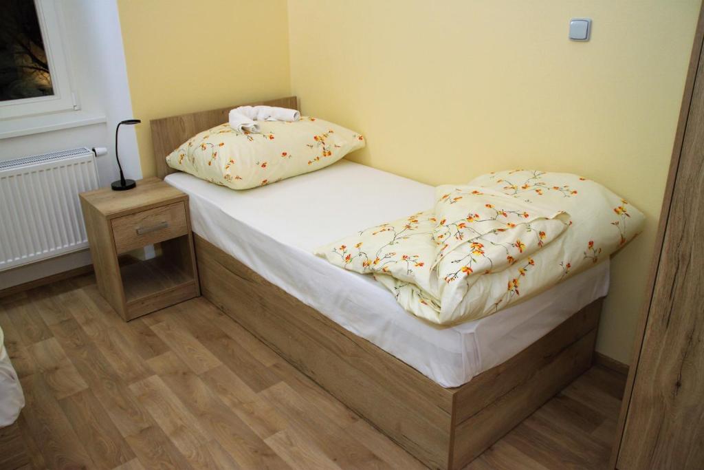 Postel nebo postele na pokoji v ubytování Penzion Daníž