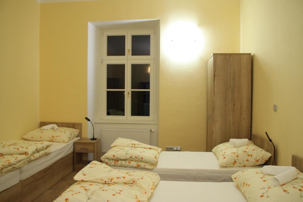 Postel nebo postele na pokoji v ubytování Penzion Daníž