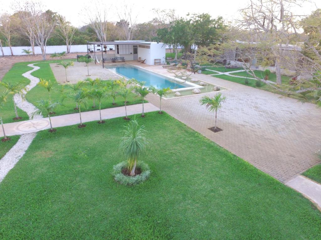 Zahrada ubytování Hotel Casa de Campo Conkal Merida