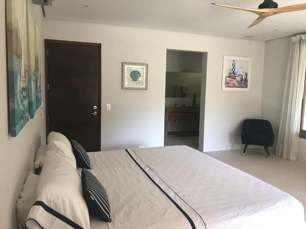 Postel nebo postele na pokoji v ubytování Casa Papito
