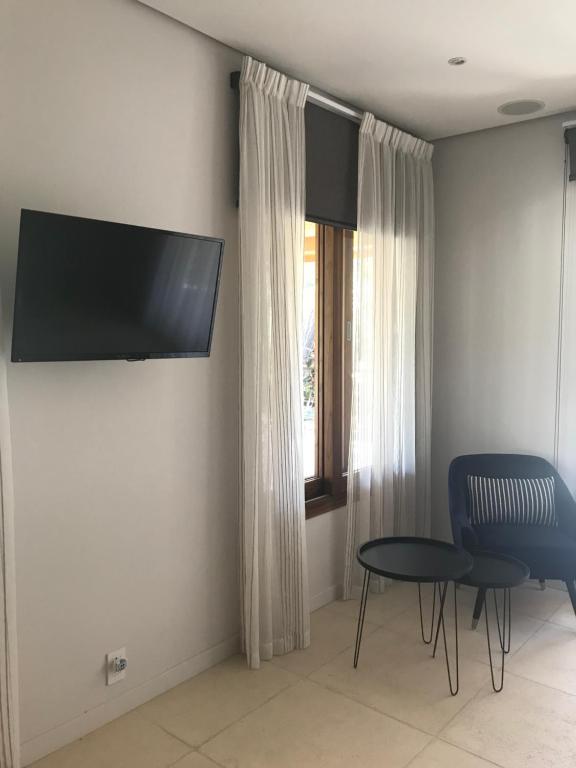 TV a/nebo společenská místnost v ubytování Casa Papito