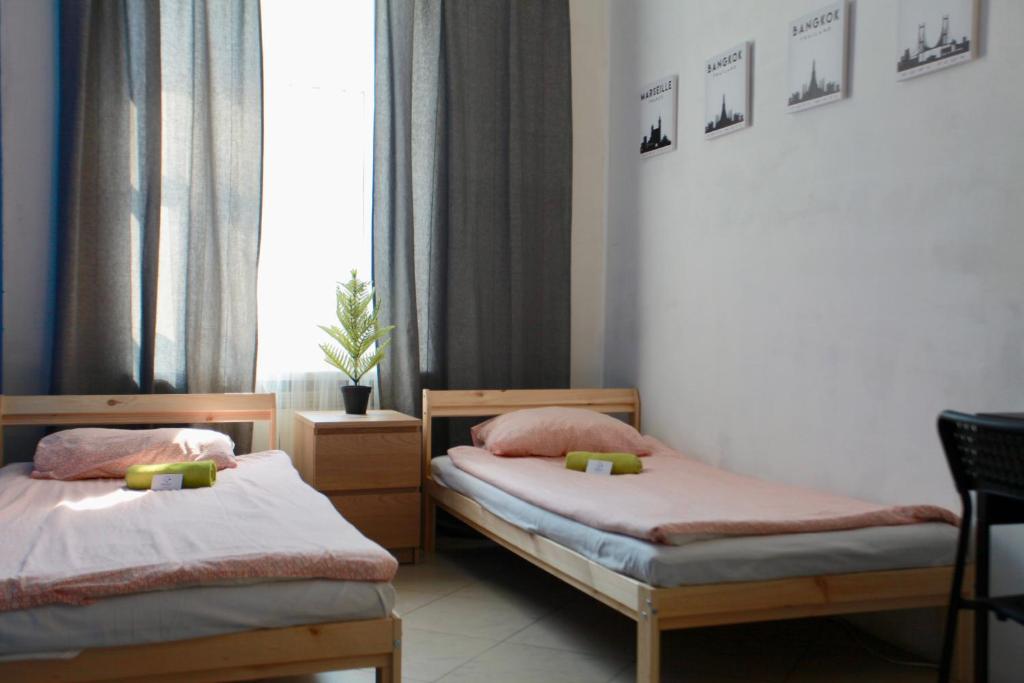 Cama o camas de una habitación en BedandBike Rooms